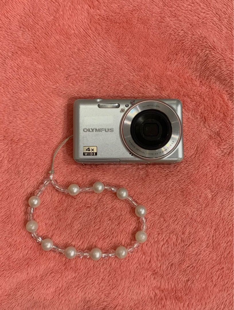 Olympus VG150 digicam (Category: Cameras) located in Bulacan. Submitted by prehyshoesdrsa (Listing ID 1392652968, Image 1). Description: Olympus VG 150 - 12 megapixels - 4x optical zoom - 4x digital zoom - metal body material — automatic focus adjustment - advanced face detection technology - working flash, zoom and all buttons — clear outputs — ready to use! Inclusions: - universal charger, wire charger, beaded wrist strap, battery Issues: -Has 