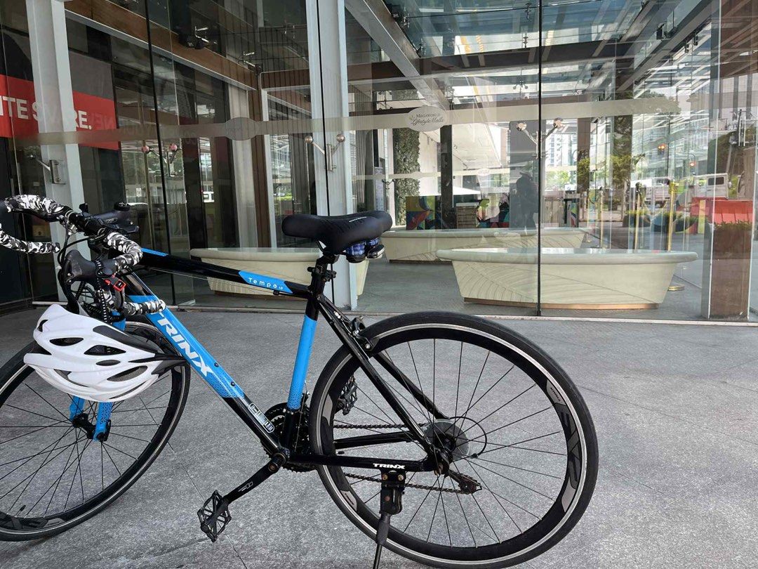 RUSH SALE!!! Trinx Tempo 1.0 (Category: Bicycles) located in Makati City. Submitted by kkkhurnitz (Listing ID 1392558350, Image 2). Description: Size 29’ Roadbike 50cm Original groupset Wheels - regular with new interior Frame - alloy Break - mechanical disc break Accessories: helmet, new bike seat with backlight Tune-up recently .