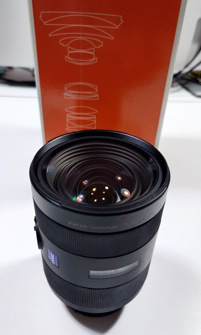 Sony Lens A-Mount 24-70mm (Category: Lens & Kits) located in Makati City. Submitted by ppomidyar (Listing ID 1392583325, Image 1). Description: F2.8 ZA SSM Zeiss Vario Sonnar T. with lens hood and box.