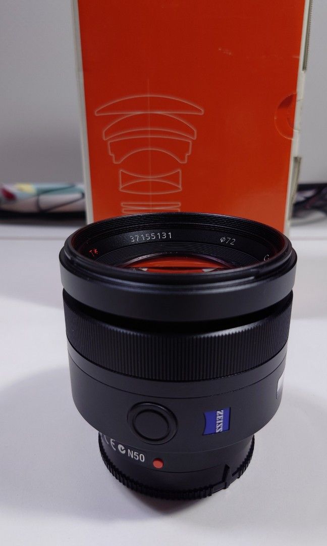 Sony Lens A-Mount 85mm (Category: Lens & Kits) located in Makati City. Submitted by ppomidyar (Listing ID 1392584897, Image 2). Description: F1.4 ZA SAL-85F14Z Zeiss Planna T* Portrait. with lens hood and box..