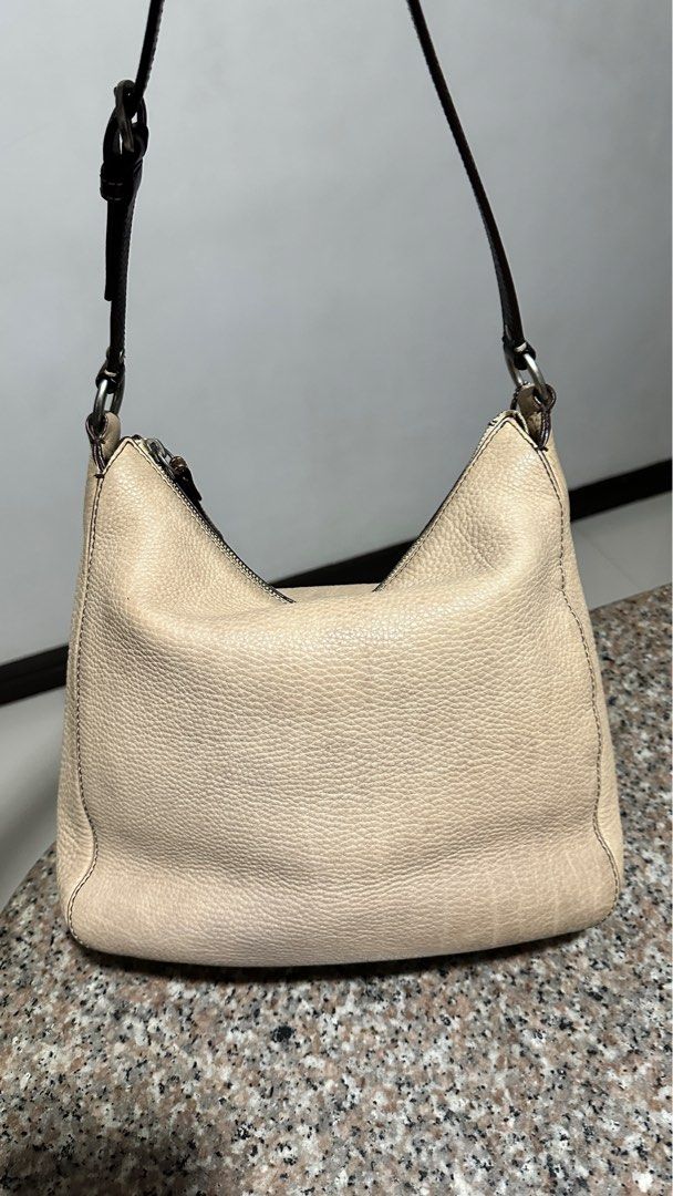 Authentic Coach Chelsea Pebbled Leather Hobo Bag (Bone) (Category: Luxury Bags & Wallets) located in Manila. Submitted by pamsayat (Listing ID 1390953815, Image 3). Description: 🔖 Hardware – 9/10 🔖 Leather – 8/10 🔖 Interior – 9/10 🔖 Size – Medium Issues: • Leather patina due to its natural characteristic • Signs of usage Reminders: • Last price is already posted and non-negotiable. • No return or exchange. All sales are final. Please ensure t