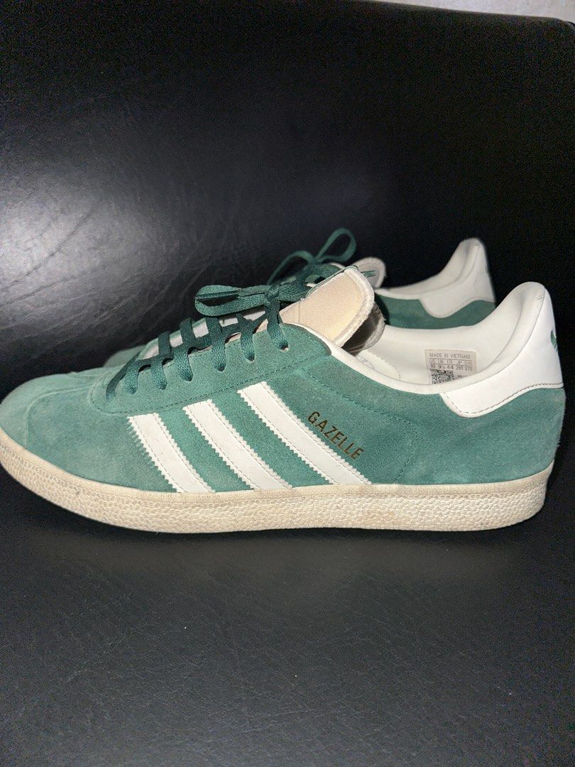 Adidas Gazelle Green - Size 10 (Category: Sneakers) located in Manila. Submitted by lawrencepinlock (Listing ID 1392797140, Image 1). Description: Selling my Adidas Gazelle in green, size US10. Classic suede upper with the iconic 3 stripes in white. Only worn a few times, still in excellent condition – almost like new. Comfortable fit, timeless style, and versatile for casual or streetwear looks. ✅ Size: US 10 ✅ Condition: Like new (minimal wear,