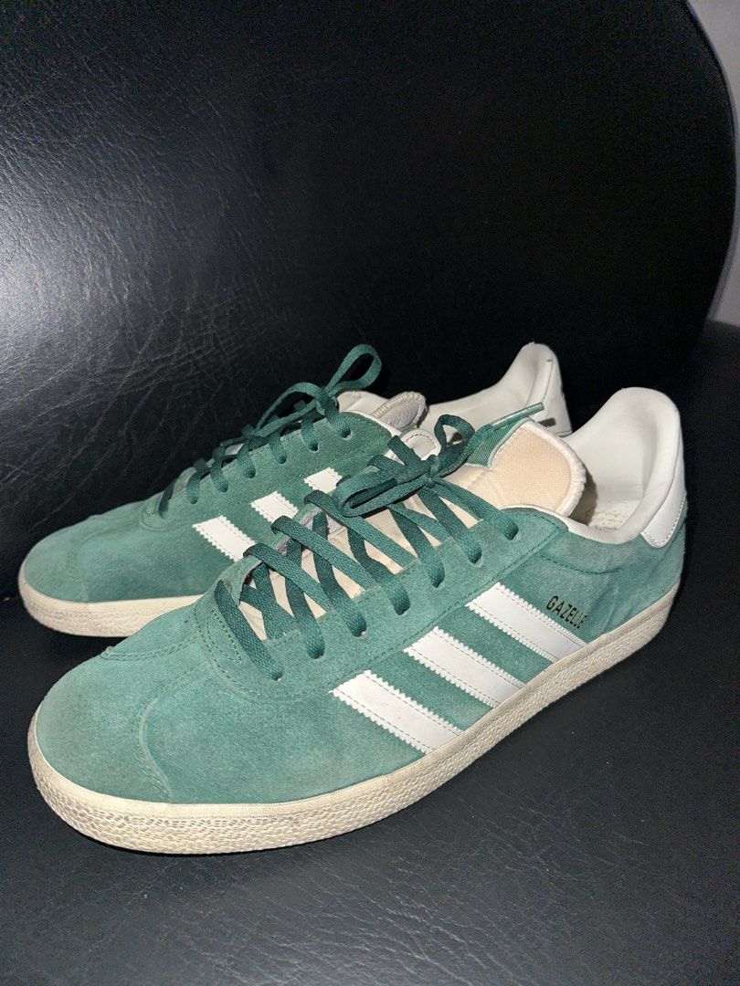 Adidas Gazelle Green - Size 10 (Category: Sneakers) located in Manila. Submitted by lawrencepinlock (Listing ID 1392797140, Image 2). Description: Selling my Adidas Gazelle in green, size US10. Classic suede upper with the iconic 3 stripes in white. Only worn a few times, still in excellent condition – almost like new. Comfortable fit, timeless style, and versatile for casual or streetwear looks. ✅ Size: US 10 ✅ Condition: Like new (minimal wear,