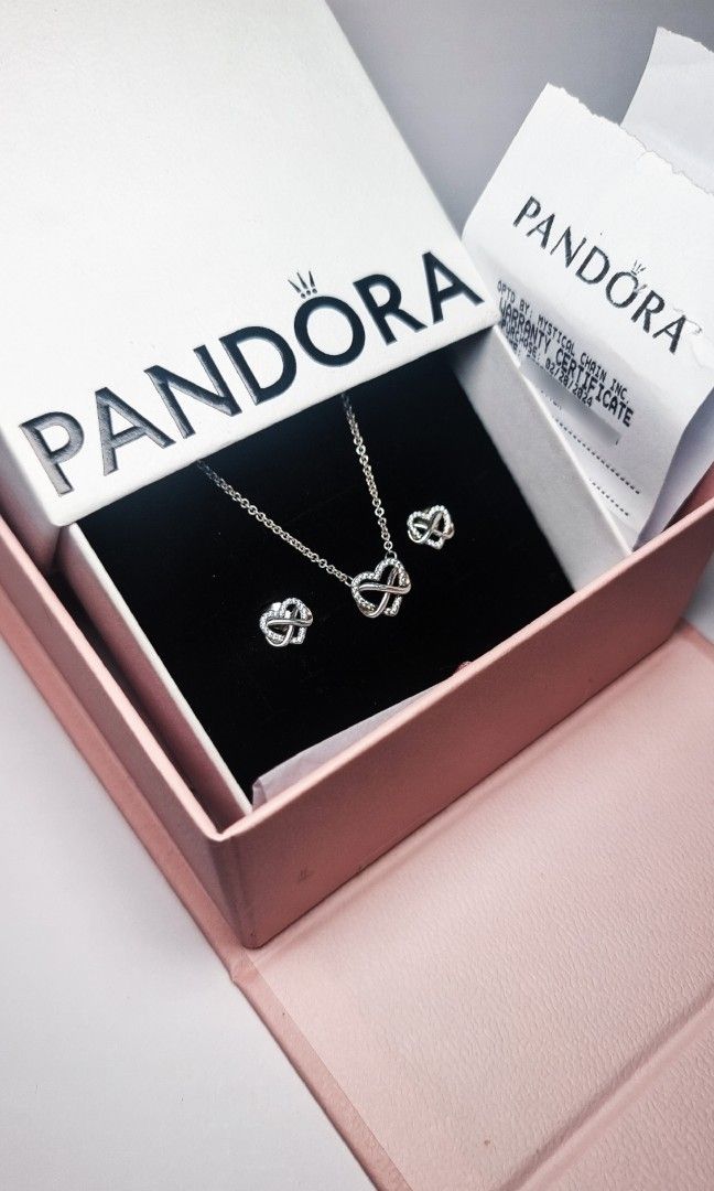 AUTHENTIC PANDORA Gift Set Necklace & Earrings Infinity Heart (Category: Necklaces) located in Makati City. Submitted by gelinep (Listing ID 1392806112, Image 3). Description: PANDORA Gift Set Necklace & Earrings Infinity Heart 💯 Authentic. Bought from Greenbelt. Was given as a gift. 🙏🏻 Php4,500 ONLY! Sold as set only. No more warranty, but providing certificate as proof of authenticity. 😊 ✨ RFS: Decluttering..
