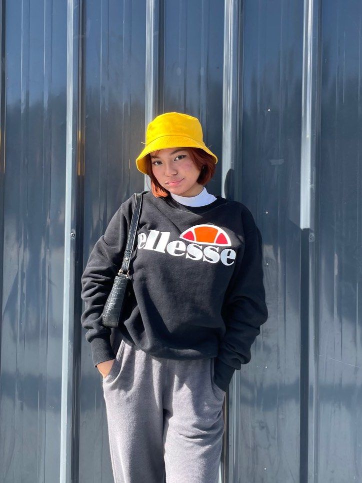 AUTHENTIC ELLESSE succiso crew neck sweatshirt (black oversized sweater) (Category: Coats, Jackets and Outerwear) located in Marikina City. Submitted by e.prelovedt (Listing ID 1392668069, Image 2). Description: ⭐️ oversized sweater for xs-m girlies !!! ⭐️ dimensions: 19x26 inches ⭐️ no flaws ⭐️ authentic rfs: decluttering.