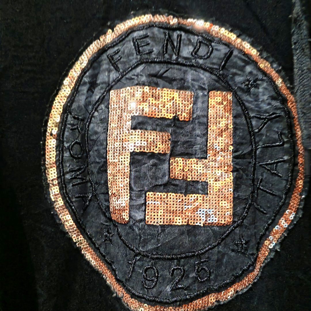 FENDI HOODIE JACKET (Category: Luxury Apparel) located in Baguio. Submitted by cc1516 (Listing ID 1386715998, Image 3). Description: -FENDI BLACK LOGO EMBROIDERED HOODIE JACKET -MADE OF VELOUR MATERIAL -DRAWSTRING HOOD -FENDI LOGO GOLD IN FRONT -MEDIUM IN SIZE -LIKE NEW -GOOD CONDITION.