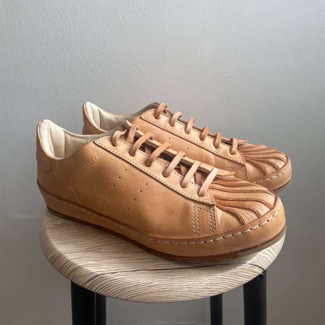 Hender scheme mip 02 (Category: Sneakers) located in Pasig City. Submitted by four_pockets (Listing ID 1392773273, Image 2). Description: Manual industrial products 02 Superstar silhouette (discontinued) Size 4 (equivalent to US 8, but can fit up to size 9.5) Excellent condition, used about 5x; leather is still fairly new, few water marks on toecap. Negotiable.