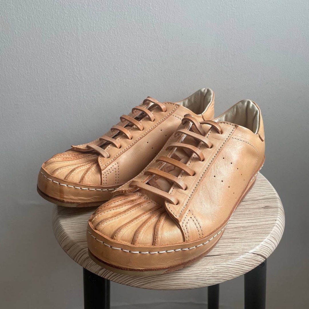 Hender scheme mip 02 (Category: Sneakers) located in Pasig City. Submitted by four_pockets (Listing ID 1392773273, Image 1). Description: Manual industrial products 02 Superstar silhouette (discontinued) Size 4 (equivalent to US 8, but can fit up to size 9.5) Excellent condition, used about 5x; leather is still fairly new, few water marks on toecap. Negotiable.
