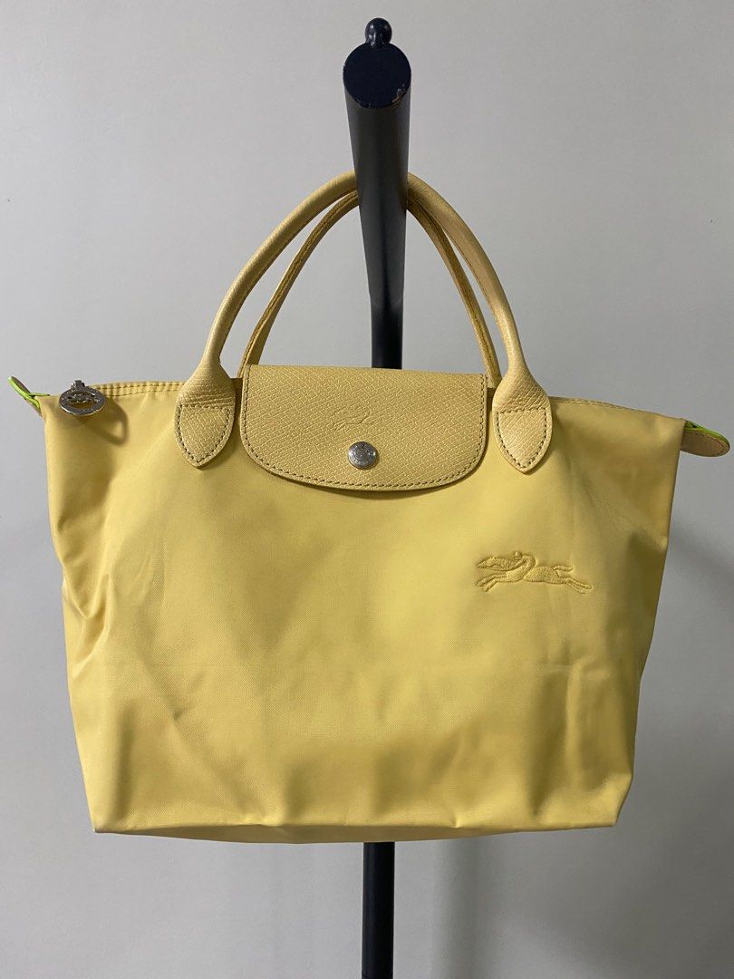 MUST GO!!! Longchamp Le Pliage Green Small (Category: Luxury Bags & Wallets) located in Davao. Submitted by kendi_shoppe (Listing ID 1392776284, Image 1). Description: In excellent used condition Size: Small Color: Wheat (Pastel yellow) No inclusions hence selling low First to pay basis. Payment Options: - GCash - BDO - BPI Shipping via J&T only.