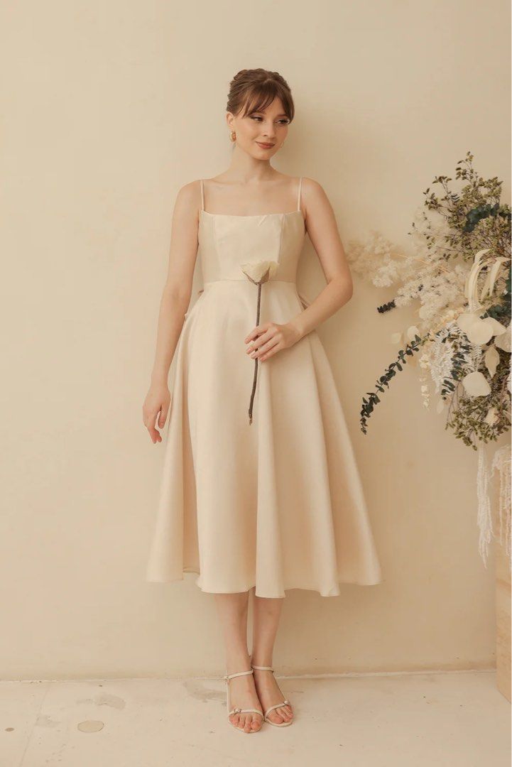 Midi Dress with Bow Back (Light Gold) (Category: Dresses) located in Taguig. Submitted by hapipeachy (Listing ID 1392796979, Image 1). Description: used once. bust side: 36 original price: 7,990 rfs: need funds!! bilhin niyo na please 🥹🥹.