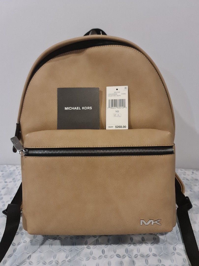 Michael Kors (MK) Leather large backpack bag (Category: Luxury Bags & Wallets) located in Quezon City. Submitted by jt.pangan (Listing ID 1392834416, Image 1). Description: fs: MK Leather Large Back pack bag color: camel can fit laptop padala from US rfs: ayaw ng bata ng mlking bag loc: QC.