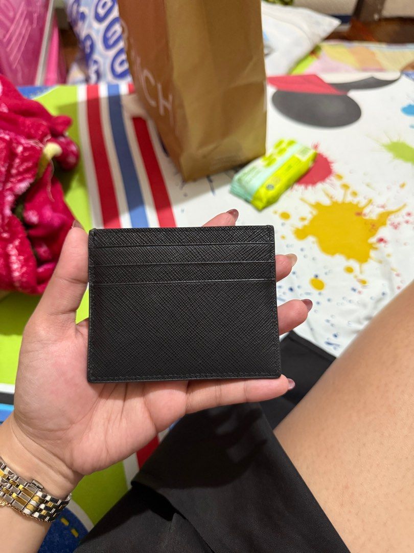 PRADA CARD HOLDER (Category: Luxury Bags & Wallets) located in Manila. Submitted by caiaguila (Listing ID 1392824133, Image 2). Description: • like new • with complete box and dust bag (nakahiwalay photos since nasa kabilang house yung card holder, not sabay ko napicture) • personal used • low ballers will not be entertained.