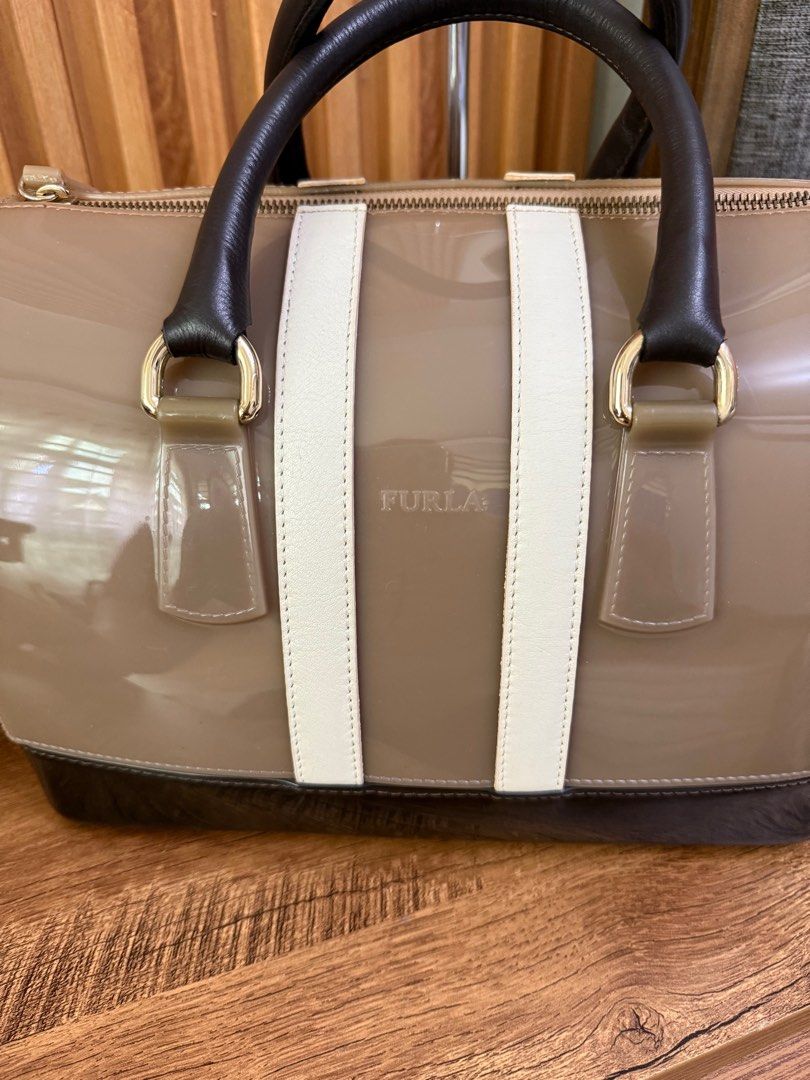 Preloved Furla Candy Bag (Category: Luxury Bags & Wallets) located in Bulacan. Submitted by mhythriftylove (Listing ID 1392715516, Image 2). Description: Authentic Furla candy bag in large size. Minimal sign of use. Color rate 9/10. Super nice in actual. Color may vary due to lighting.t.