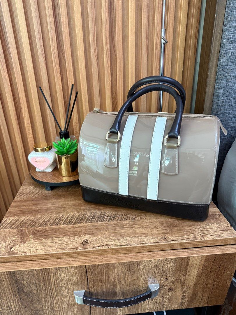 Preloved Furla Candy Bag (Category: Luxury Bags & Wallets) located in Bulacan. Submitted by mhythriftylove (Listing ID 1392715516, Image 1). Description: Authentic Furla candy bag in large size. Minimal sign of use. Color rate 9/10. Super nice in actual. Color may vary due to lighting.t.