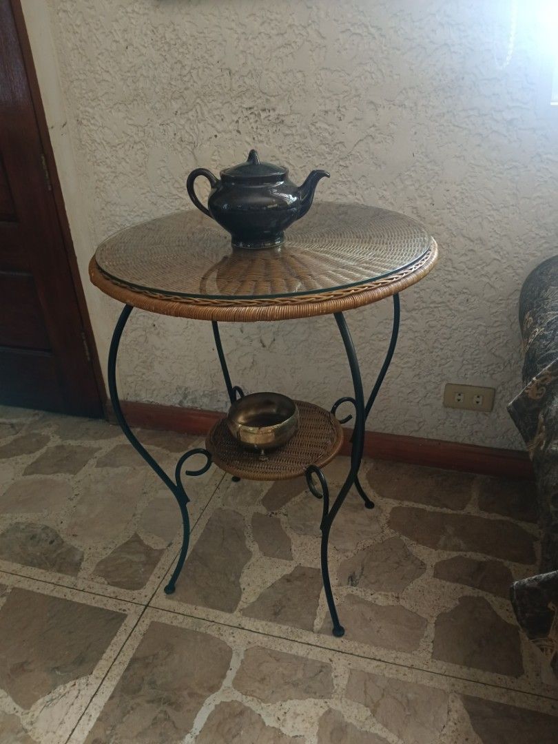 Round Accent / Coffee Table (Wicker Finished) (Category: Tables & Sets) located in Manila. Submitted by gieboy65 (Listing ID 1392790828, Image 1). Description: Wicker Finished Metal Base Glass on Top ( No Chips) Excellent Shape and Condition See Photos for References Location Dona Rosario Hts Subd Sucat Muntinlupa MOP Gcash or cash upon pick up.