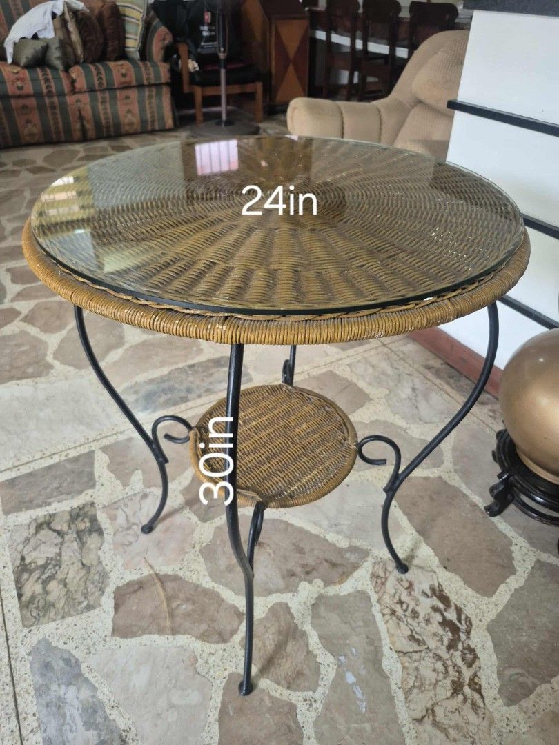 Round Accent / Coffee Table (Wicker Finished) (Category: Tables & Sets) located in Manila. Submitted by gieboy65 (Listing ID 1392790828, Image 2). Description: Wicker Finished Metal Base Glass on Top ( No Chips) Excellent Shape and Condition See Photos for References Location Dona Rosario Hts Subd Sucat Muntinlupa MOP Gcash or cash upon pick up.