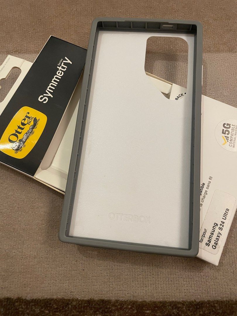 S24 Ultra Case Otterbox Symmetry (Category: Cases & Sleeves) located in Quezon City. Submitted by saoirse027 (Listing ID 1392844465, Image 3). Description: Otterbox Symmetry Case Authentic Like BrandNew!! With Original Box Color: White and Gray For S24 Ultra Negotiable for sure buyers MOP: Gash.