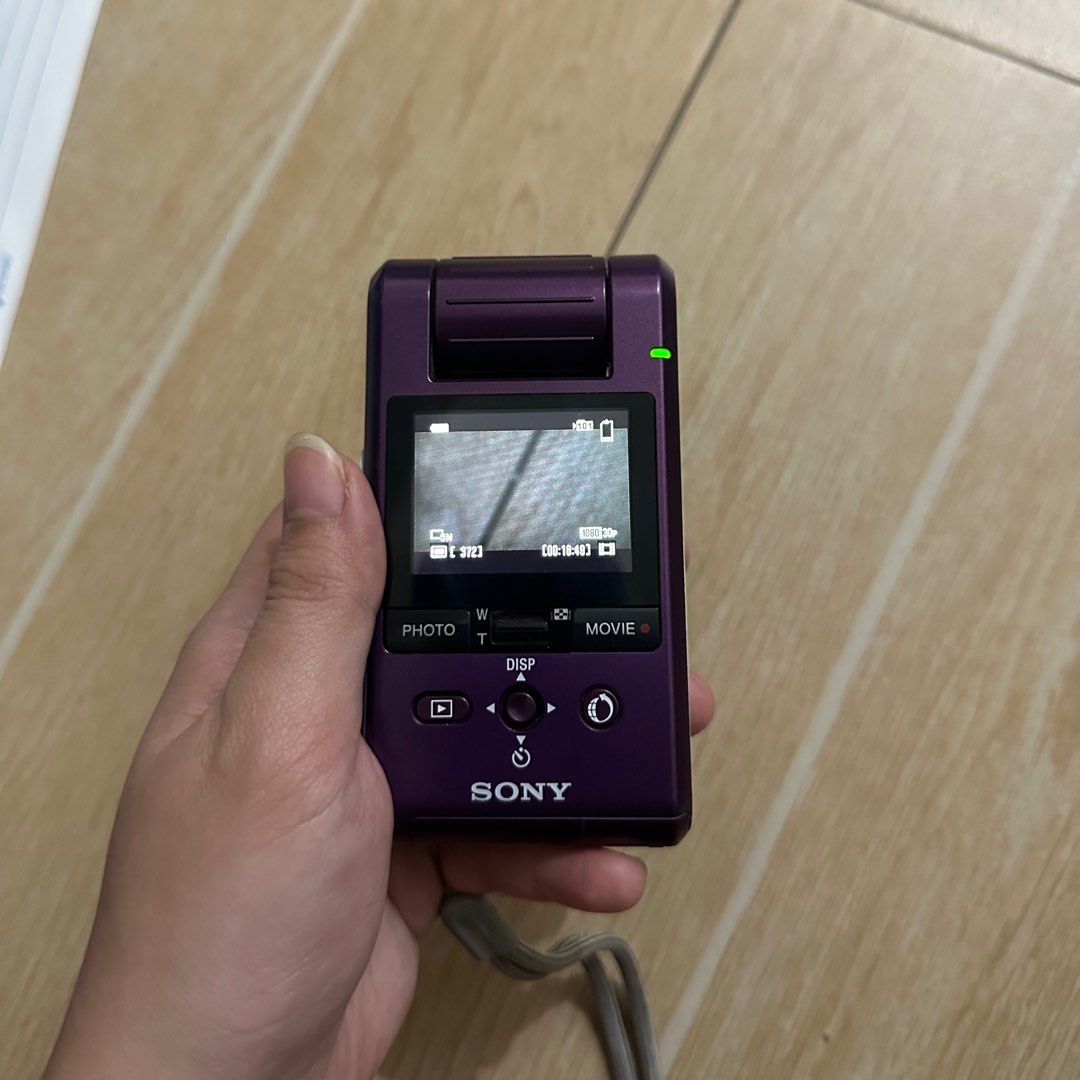 Working Sony Digicam (Category: Cameras) located in Cebu City. Submitted by bcdeclutters (Listing ID 1392789038, Image 2). Description: About the camera: * Model: Sony Webbie HD MHS-PM1 * Fully functional * Bought in 2009 but seldom used * With rotating lens (180° front to back) * One issue: the side flap has come off but you can tape or glue it Included: * Brand new battery * Original Sony charger * Memory card reader NOT included: * Memory stic