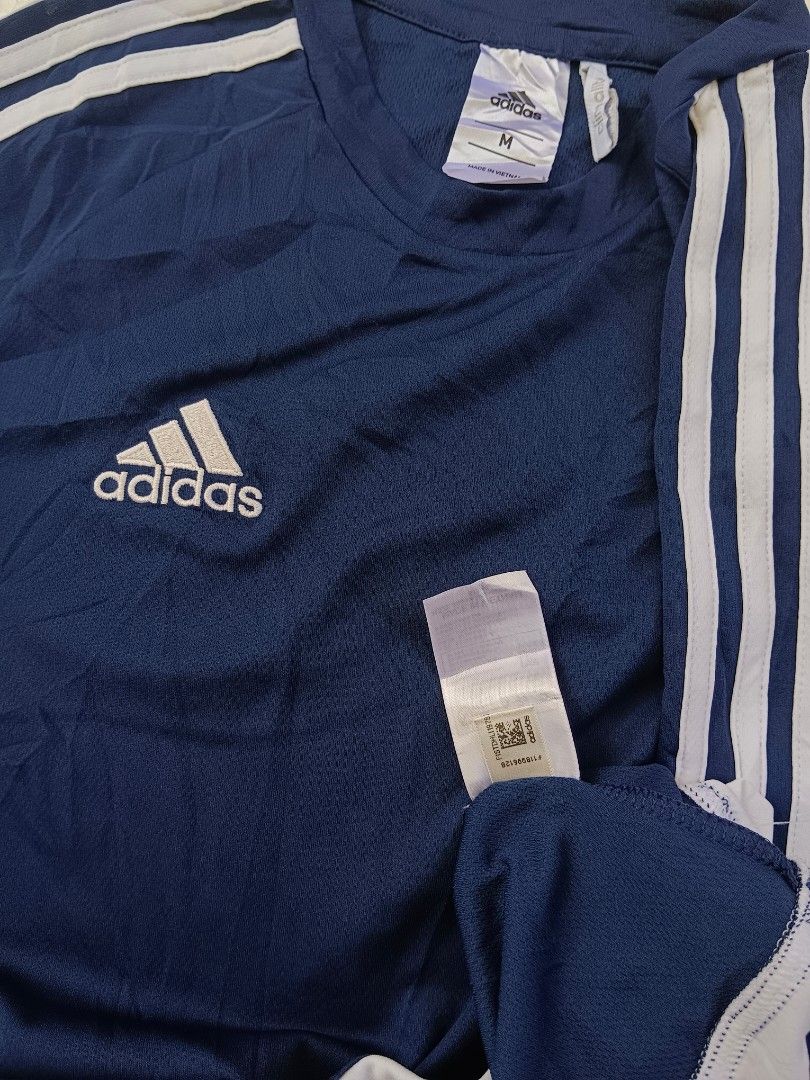 Adidas Climalite Shirt (Category: Luxury Apparel) located in Davao. Submitted by thriftbuddy (Listing ID 1393000750, Image 2). Description: size M width 17" (stretch) length 26" as new condition 10/10 colorate no flaws see photos for details still presentable to wear.