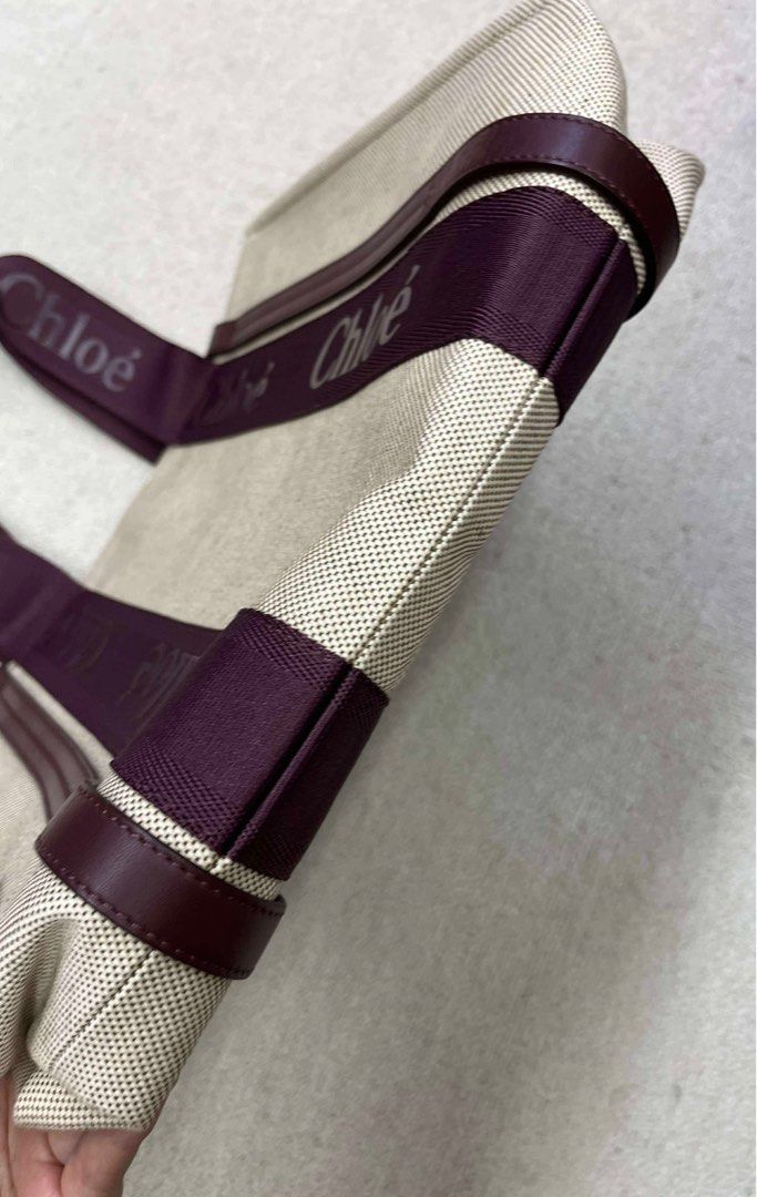 Authentic Chloe Woody Rare Color Medium Tote (Category: Luxury Bags & Wallets) located in San Pablo. Submitted by LBRPoshDealsEtc (Listing ID 1392885633, Image 2). Description: 💯 authentic Chloe Woody Ribbon Tote Rare color burgundy in medium size Like brand new condition Bought for 82,000++tax Canvas with twill lining Made in Italy Open top Interior slip pocket Leather trim with contrast stitching detail Screen print logo lettering along straps