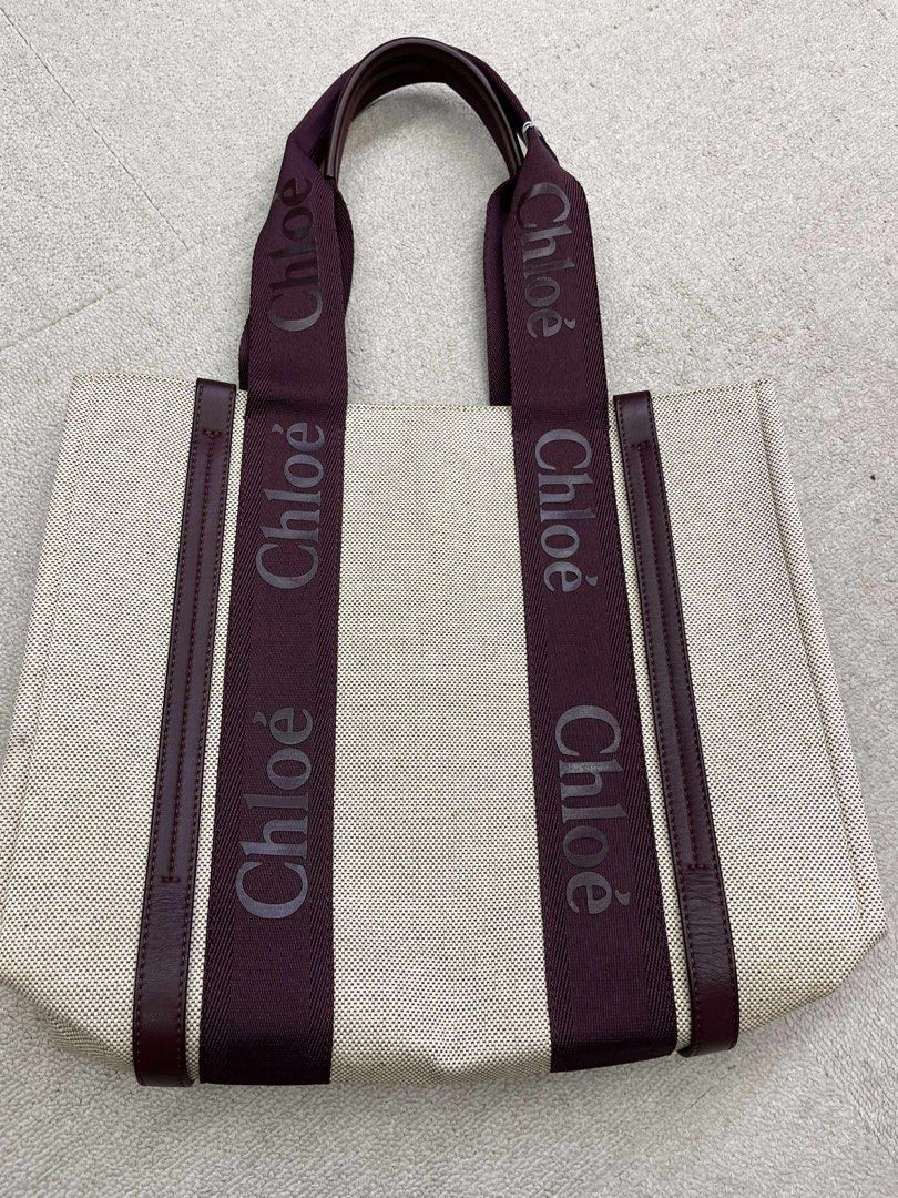 Authentic Chloe Woody Rare Color Medium Tote (Category: Luxury Bags & Wallets) located in San Pablo. Submitted by LBRPoshDealsEtc (Listing ID 1392885633, Image 1). Description: 💯 authentic Chloe Woody Ribbon Tote Rare color burgundy in medium size Like brand new condition Bought for 82,000++tax Canvas with twill lining Made in Italy Open top Interior slip pocket Leather trim with contrast stitching detail Screen print logo lettering along straps