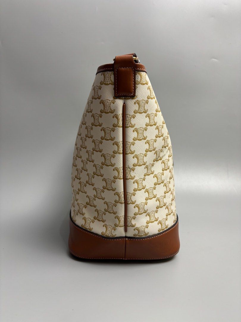Celine Bucket Bag triomphe coated canvas (Category: Luxury Bags & Wallets) located in Quezon City. Submitted by lucky.purelux.ph (Listing ID 1393026989, Image 3). Description: Celine Bucket Bag triomphe coated canvas excellent condition no discoloration no flaws no issue MOP: gcash, bank transfer (bpi) Courier: J&T, lalamove Please view all uploaded photos before purchase you can also ask questions about the item Location: quezon city fairview Me