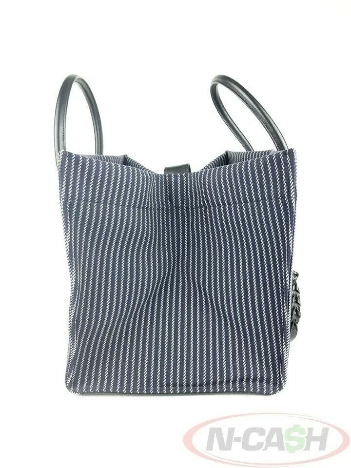 Celine Striped Navy White Medium Phantom Luggage Bag (Category: Luxury Bags & Wallets) located in Quezon City. Submitted by luxury_by_n-cash (Listing ID 1392957844, Image 3). Description: N-Cash Pawnshop "Instant Cash for Bags, Watches, Cars, and Electronics" https://www.ncash-pawnshop-philippines.com/ Celine Striped Navy White Medium Phantom Luggage Bag Measures: 11.75″ L (at base), 22.5″ (at wings) x 11″ H x 10″ D (approx) 5″ Handle Drop Materi