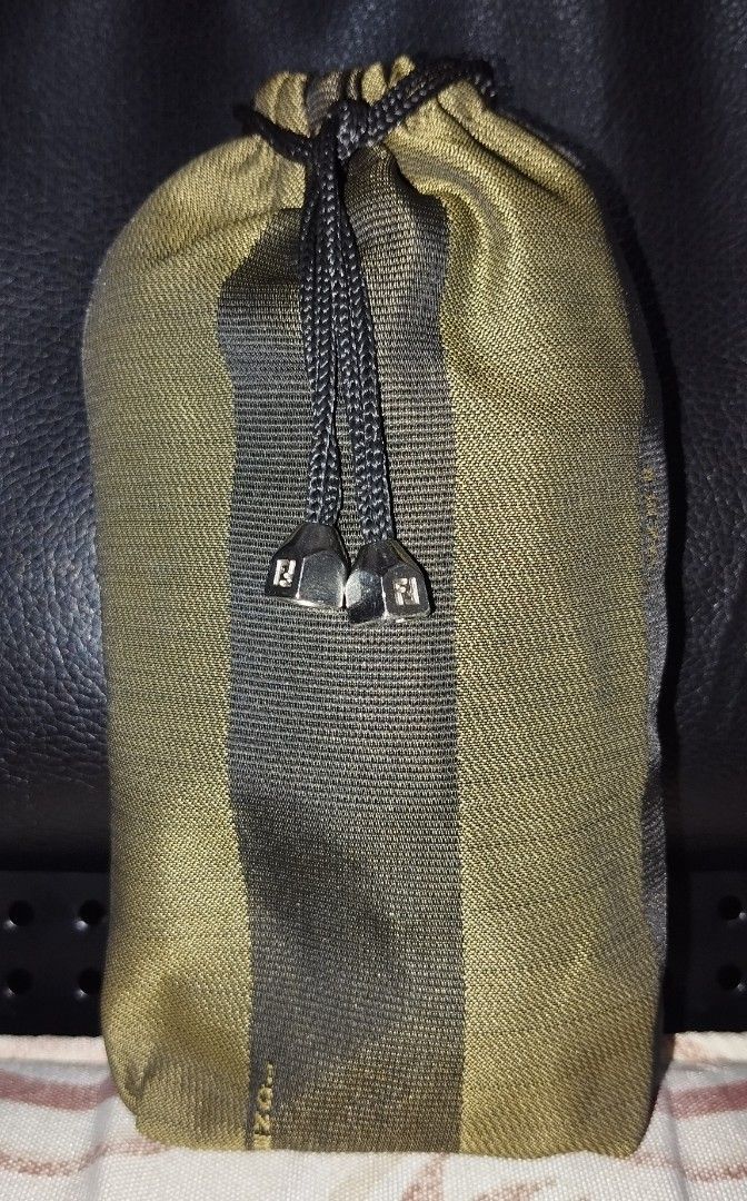 Fendi 7" Drawstring Pouch (Category: Luxury Bags & Wallets) located in Taguig. Submitted by belle25cabano (Listing ID 1392946092, Image 3). Description: Fendi Drawstring Pouch made in Italy, searchable and with etichetta no rips and tears no bubbles, no runs matingkad pa color engraved drawstring ready to use *** can be used as sunglass/cellphone/cosmetic case *** cute sya - pwede rin coin purse Lalamove, LBC COP or J&T.