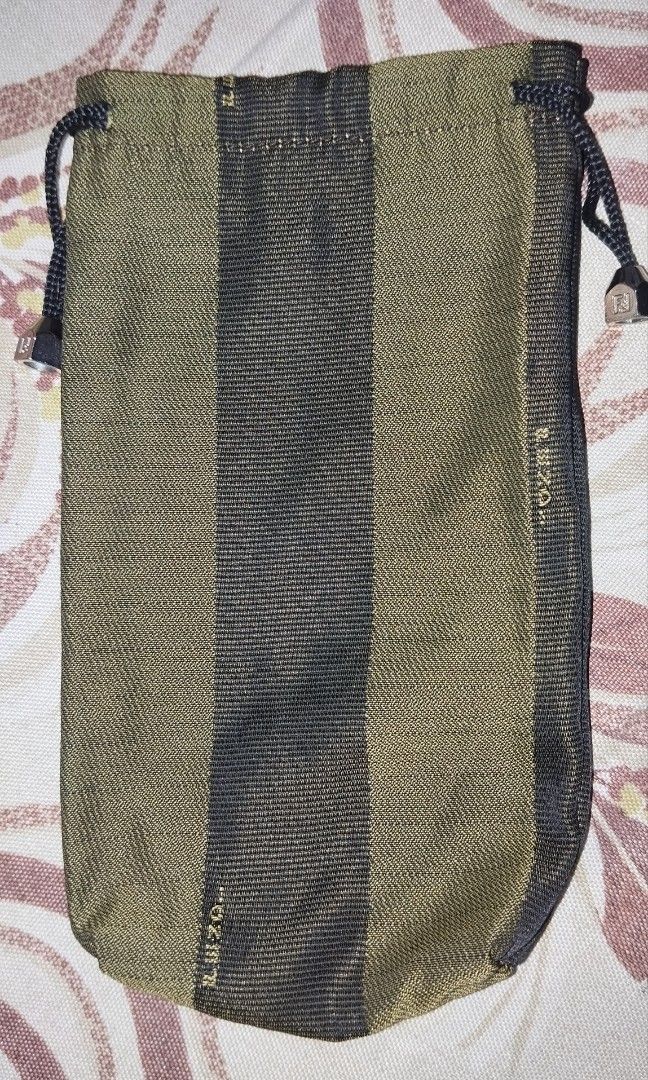 Fendi 7" Drawstring Pouch (Category: Luxury Bags & Wallets) located in Taguig. Submitted by belle25cabano (Listing ID 1392946092, Image 1). Description: Fendi Drawstring Pouch made in Italy, searchable and with etichetta no rips and tears no bubbles, no runs matingkad pa color engraved drawstring ready to use *** can be used as sunglass/cellphone/cosmetic case *** cute sya - pwede rin coin purse Lalamove, LBC COP or J&T.