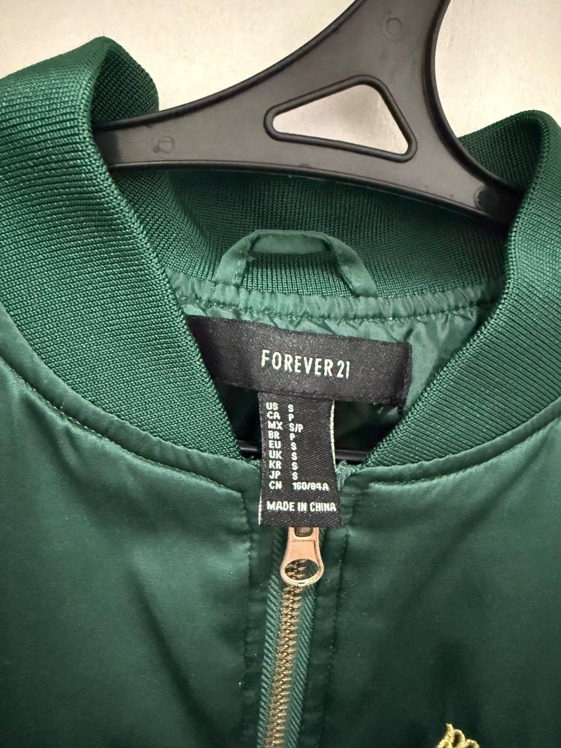 Forever 21 Green Bomber Jacket (Category: Coats, Jackets and Outerwear) located in Pasig City. Submitted by danielcf (Listing ID 1345200807, Image 3). Description: Preloved. Original. Negotiable. Shipping from Binan, Laguna..