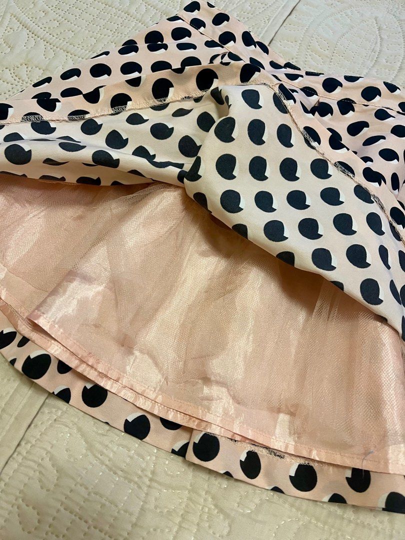 Forever 21 Skater Skirt (Category: Skirts) located in Makati City. Submitted by daysoftheriver1122 (Listing ID 1392928565, Image 2). Description: Wanna look sweet and demure — and a bit flirty? 🤭 This skirt is perfect then! 🌸 🌈 Color: Baby Pink with Black Polka Dots 📏 Size: Waist 28” | Length 14” .