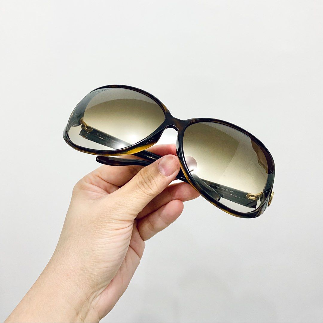 Gucci Sunglasses (Category: Luxury Accessories) located in Makati City. Submitted by aideclutter (Listing ID 1392970836, Image 1). Description: • Rarely used • Oversized lens • Case is peeling due to longtime storage • No lens cloth (I lost it) • Please check photos for details • Serious buyers only (Please don’t waste my time).