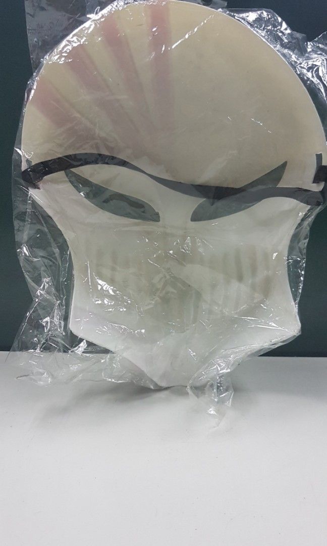 Ichigo Facemask Anime Costume Cosplay (Category: Figurines & Statues) located in Quezon City. Submitted by whizdepot (Listing ID 1392888443, Image 2). Description: This image shows a replica of Ichigo Kurosaki's Hollow Mask from the anime series Bleach. This specific mask is associated with Ichigo's Hollowfication, a state where he gains Hollow powers. It's a popular item for cosplay and fans of the Bleach series. Similar masks are available for 