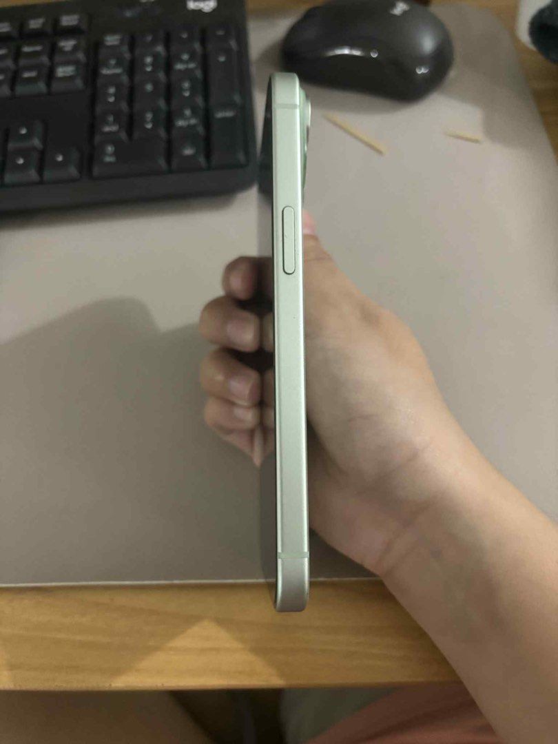 Iphone 15 Green 128gb (Category: iPhone 15 Series) located in Valenzuela. Submitted by projectrtb (Listing ID 1392990515, Image 2). Description: Iphone 15 - Green 128gb Globe locked Battery Health - 90% With box & cable Varna film - UV (Screen Protector) Receipt Bought last : 07/28/2024 .