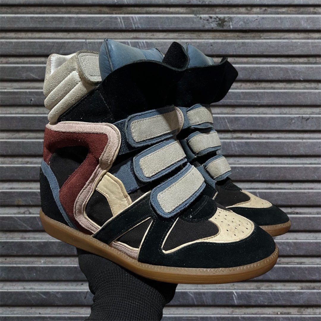 Isabel Marant Bekett Wedge Sneakers (Category: Wedges) located in Davao. Submitted by 643469_ (Listing ID 1393056792, Image 1). Description: in this rare multicolor combo are straight from the 2010s fashion hall of fame. with soft suede panels in cream, blue, burgundy, and black, plus layered velcro straps and those classic gum soles, they’re a bold throwback that still hits. hidden wedge gives you that signature Marant lift. as the Y2K and early