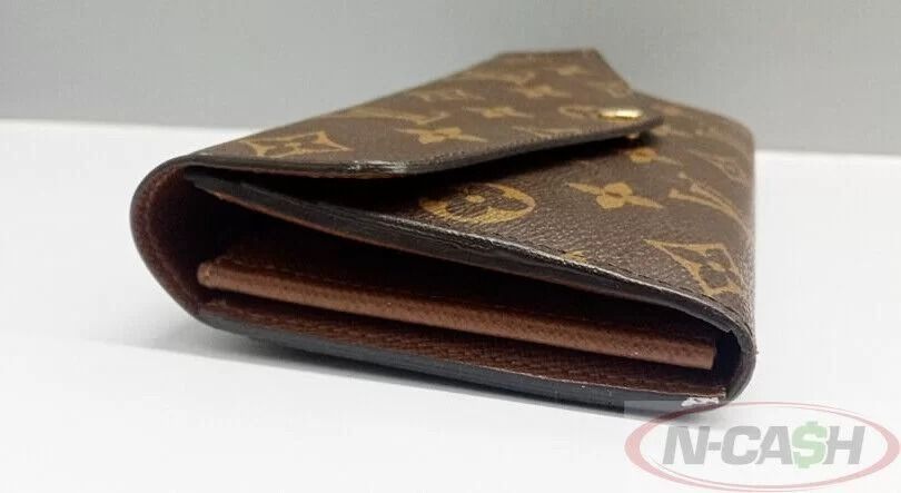 Louis Vuitton Sarah Monogram Canvas Envelope Wallet (Category: Luxury Bags & Wallets) located in Quezon City. Submitted by luxury_by_n-cash (Listing ID 1392967169, Image 3). Description: N-Cash Pawnshop "Instant Cash for Bags, Watches, Cars, and Electronics" https://www.ncash-pawnshop-philippines.com/ Louis Vuitton Sarah Monogram Canvas Envelope Wallet Measures: 7.5″ L x 4.1″ H x 1″ D (approx) Material: Monogram Canvas Cross-Grain Leather Lining 