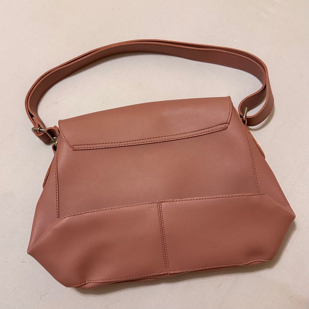 Parisian Old Rose Purse (Category: Purses & Pouches) located in Quezon City. Submitted by secondseason_ph (Listing ID 1392981140, Image 2). Description: • Authentic and preloved. • No damages. • Ships via Lalamove (within Metro Manila) and J&T Express (outside Metro Manila). More items are found on our Instagram @secondseason_ph..