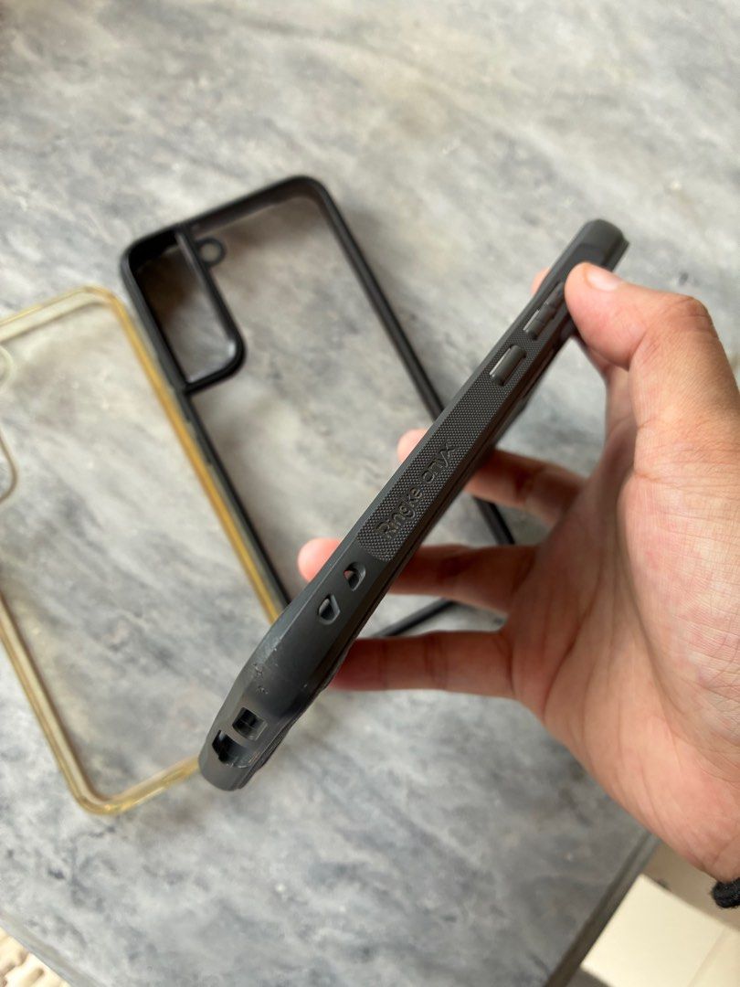 Ringke Onyx S22 Case with Camera Glass Protector (Category: Cases & Sleeves) located in San Pablo. Submitted by habyerj (Listing ID 1393050639, Image 3). Description: Ringke Onyx S22 Case with Camera Glass Protector 8/10 condition with 2 pcs Ringke Camera Glass Protector and Ringke Strap free 2 cases slightly nego price MOD: j&t, lalamove, grab can ship from Batangas, Laguna, Taguig, Manila, Antipolo .