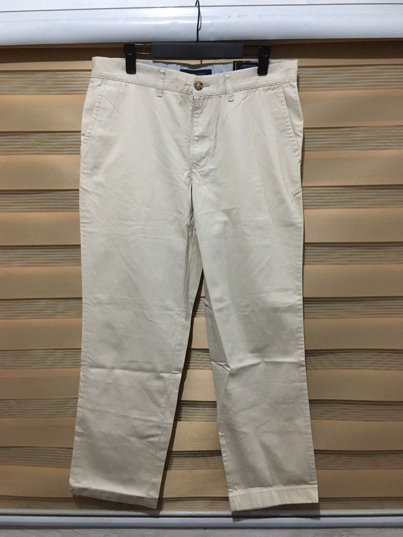 Tommy Hilfiger Chino size 33-34 (Category: Trousers) located in Manila. Submitted by findph09 (Listing ID 1393010328, Image 3). Description: Tommy Hilfiger Chino Beige color Waistline 33-34 fitting Length 38.5 Hem 8 Brandnew condition No flaws Price: 850+sf Lalamove & Jntexpress Courier 🚚.
