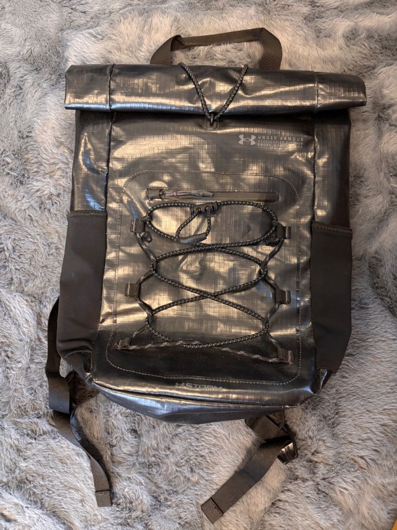 Under Armour Backpack (Category: Backpacks) located in Quezon City. Submitted by habitto.ph (Listing ID 1392981623, Image 1). Description: Under Armour Backpack Water Resistant Summit Backpack Color: Black Condition: Excellent Condition (Used a couple of times only) With 13” Laptop Compartment (Padded) 12 cmW x 43 cmH x 27 cmL (folded & locked by the bungee) Authentic, bought in UA SM Megamall Not a reseller — items posted are my personal items R