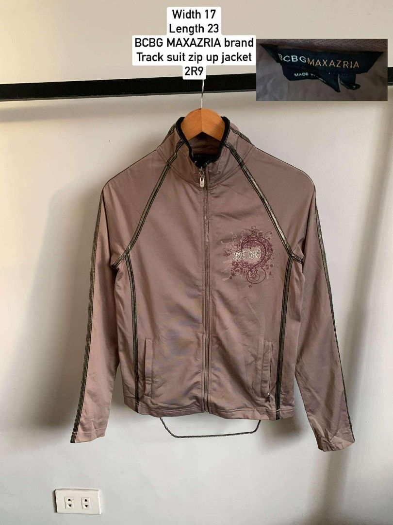 BCBG MAXAZRIA brand zip up track suit jacket (Category: Coats, Jackets and Outerwear) located in Angono. Submitted by angelrap04 (Listing ID 1393119215, Image 1). Description: width 17 inches length 23 inches.