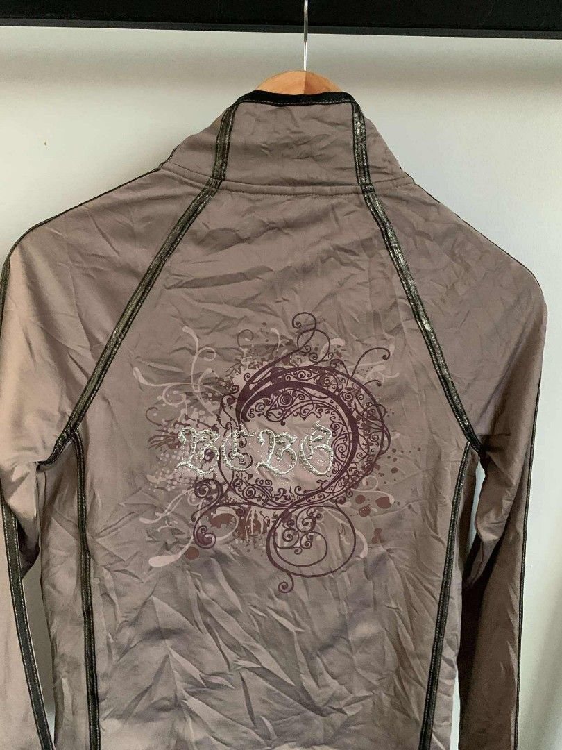 BCBG MAXAZRIA brand zip up track suit jacket (Category: Coats, Jackets and Outerwear) located in Angono. Submitted by angelrap04 (Listing ID 1393119215, Image 3). Description: width 17 inches length 23 inches.
