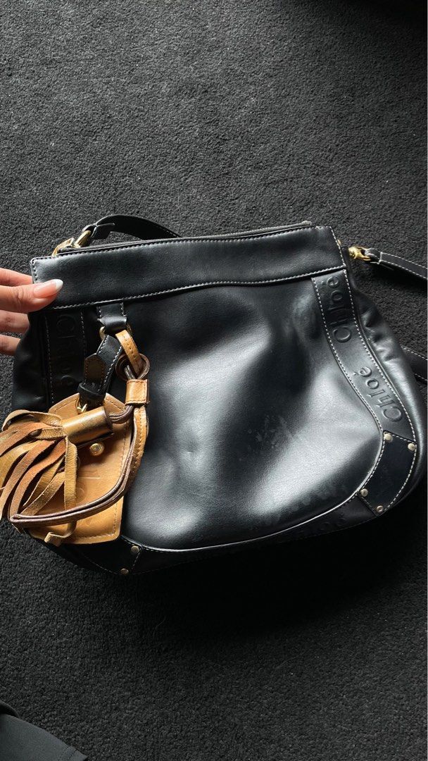 Chloe Eden Leather Tote Bag Black (Category: Luxury Bags & Wallets) located in Makati City. Submitted by r0w33 (Listing ID 1393096790, Image 2). Description: Vintage Chloé Eden Leather Tote Bag Black Has minor flaw Still good leather condition Classy and durable .