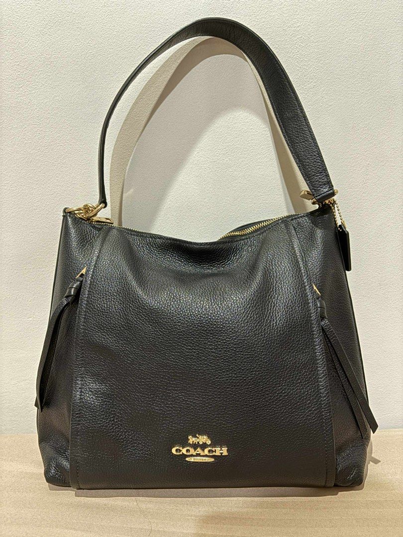Coach Marlon Hobo (Category: Luxury Bags & Wallets) located in Quezon City. Submitted by abelikaa (Listing ID 1393154025, Image 3). Description: Refined pebble leather Inside zip pocket Zip-top closure, fabric lining Handle with 9" drop Outside zip pockets Detachable strap with 20" drop for shoulder or crossbody wear 12 3/4" (L) x 11 1/4" (H) x 4 1/2" (W) Guaranteed Auth💯.