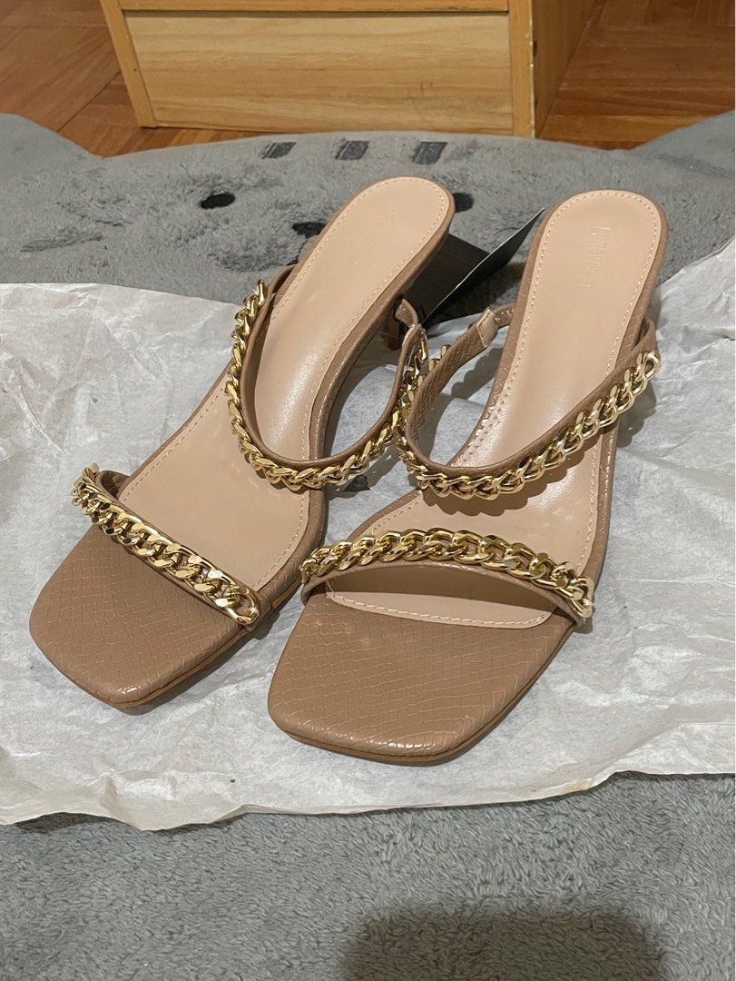 F21 Gold Chain Slip On Heels (Category: Heels) located in Cavite. Submitted by HelloAnn_Closet (Listing ID 1393141167, Image 1). Description: Bought online comes with generic box and tag. Cute kitten heels. Very comfy when worn. In 24cm approx RFS: Decluttering .