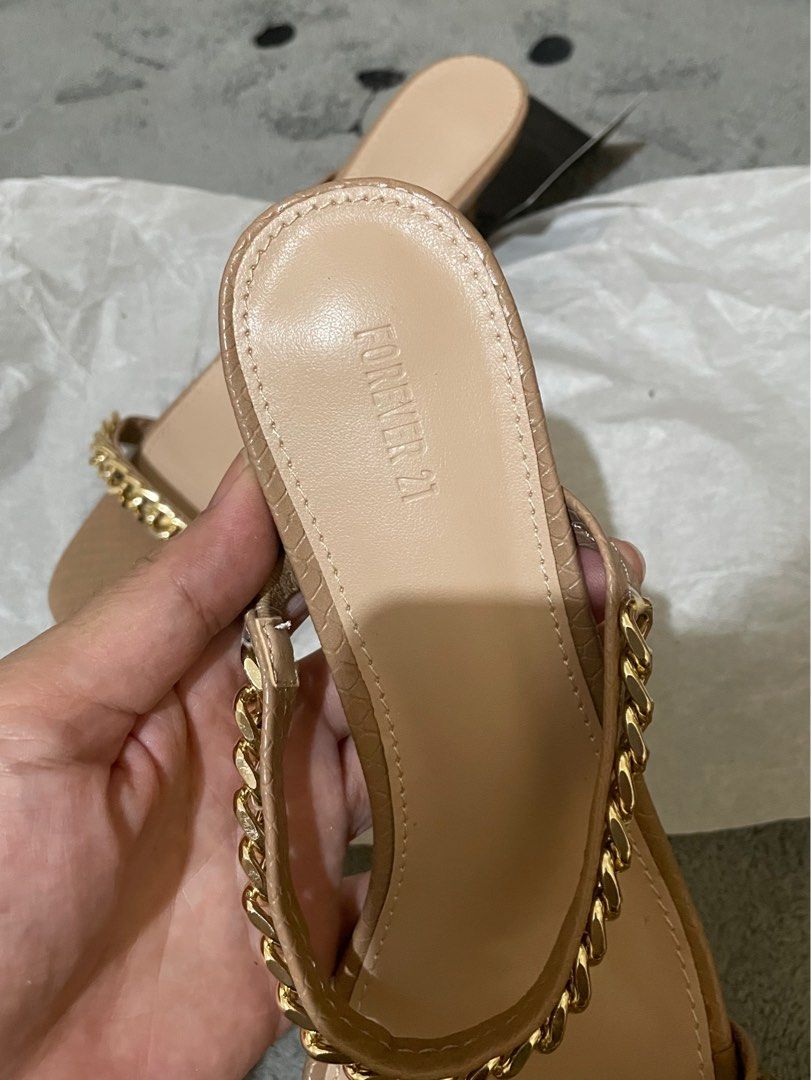 F21 Gold Chain Slip On Heels (Category: Heels) located in Cavite. Submitted by HelloAnn_Closet (Listing ID 1393141167, Image 3). Description: Bought online comes with generic box and tag. Cute kitten heels. Very comfy when worn. In 24cm approx RFS: Decluttering .