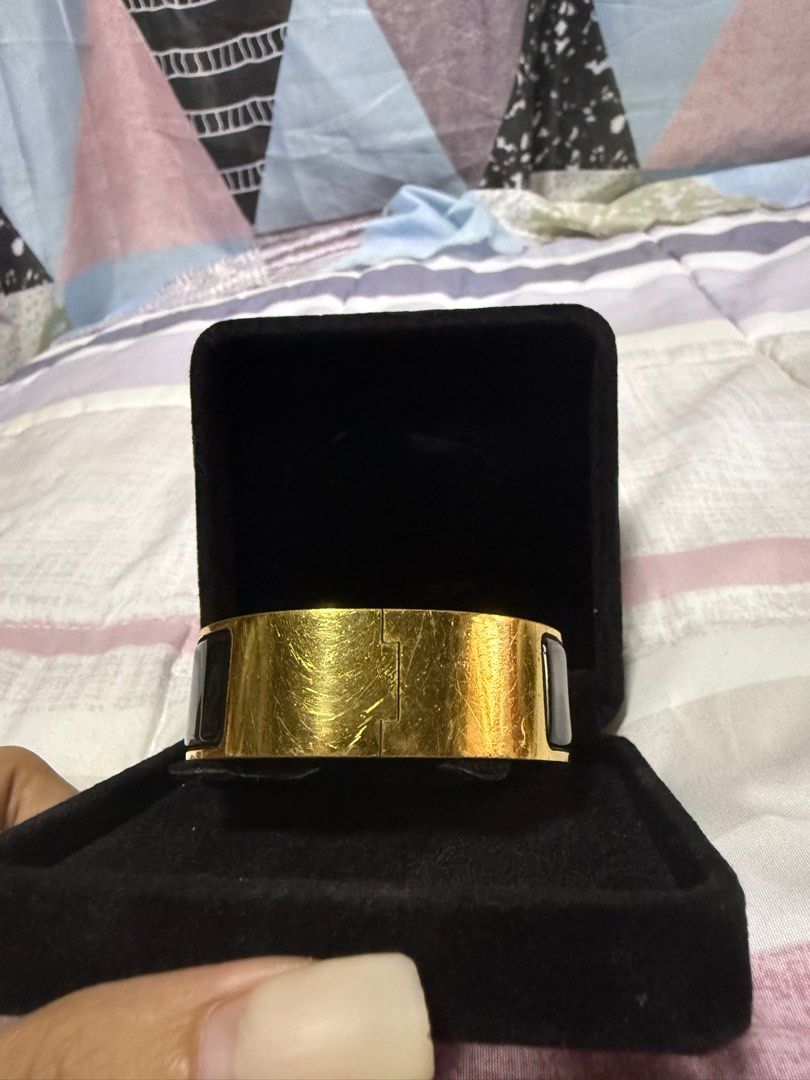 Hermes Clic H Bracelet wide (Category: Luxury Accessories) located in Manila. Submitted by urbantrendsetter (Listing ID 1393157354, Image 3). Description: Color: Black Size: PM Material: Metal Enamel Hardware: Gold Condition: 7/10 (Some Visible Wear) Includes: provided box.