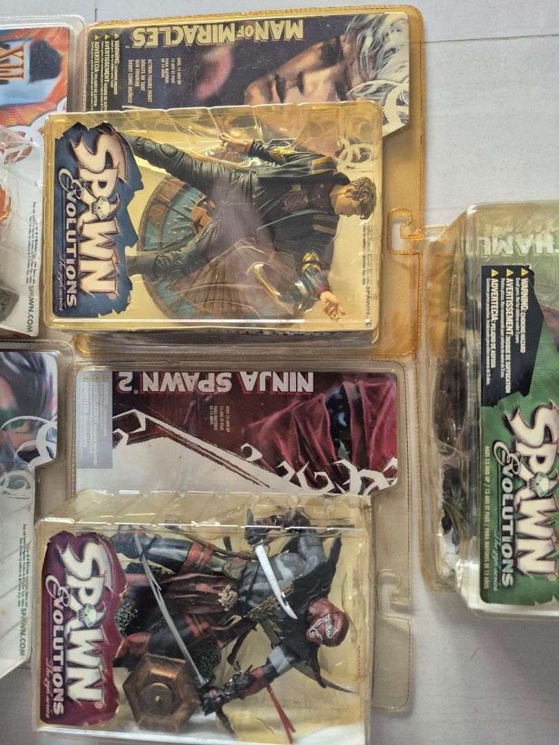 McFarlane Spawn Evolution series (Category: Toy Figures) located in Singapore. Submitted by giraffacus (Listing ID 1393216252, Image 3). Description: Set of 5 McFarlane Spawn Evolutions figures. Condition of boxes varies and can be found in photos. Collector item! .