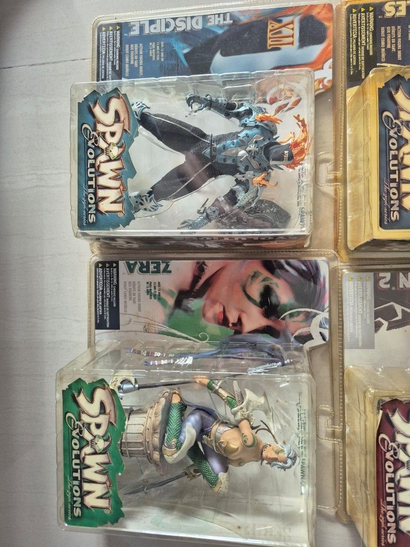 McFarlane Spawn Evolution series (Category: Toy Figures) located in Singapore. Submitted by giraffacus (Listing ID 1393216252, Image 4). Description: Set of 5 McFarlane Spawn Evolutions figures. Condition of boxes varies and can be found in photos. Collector item! .