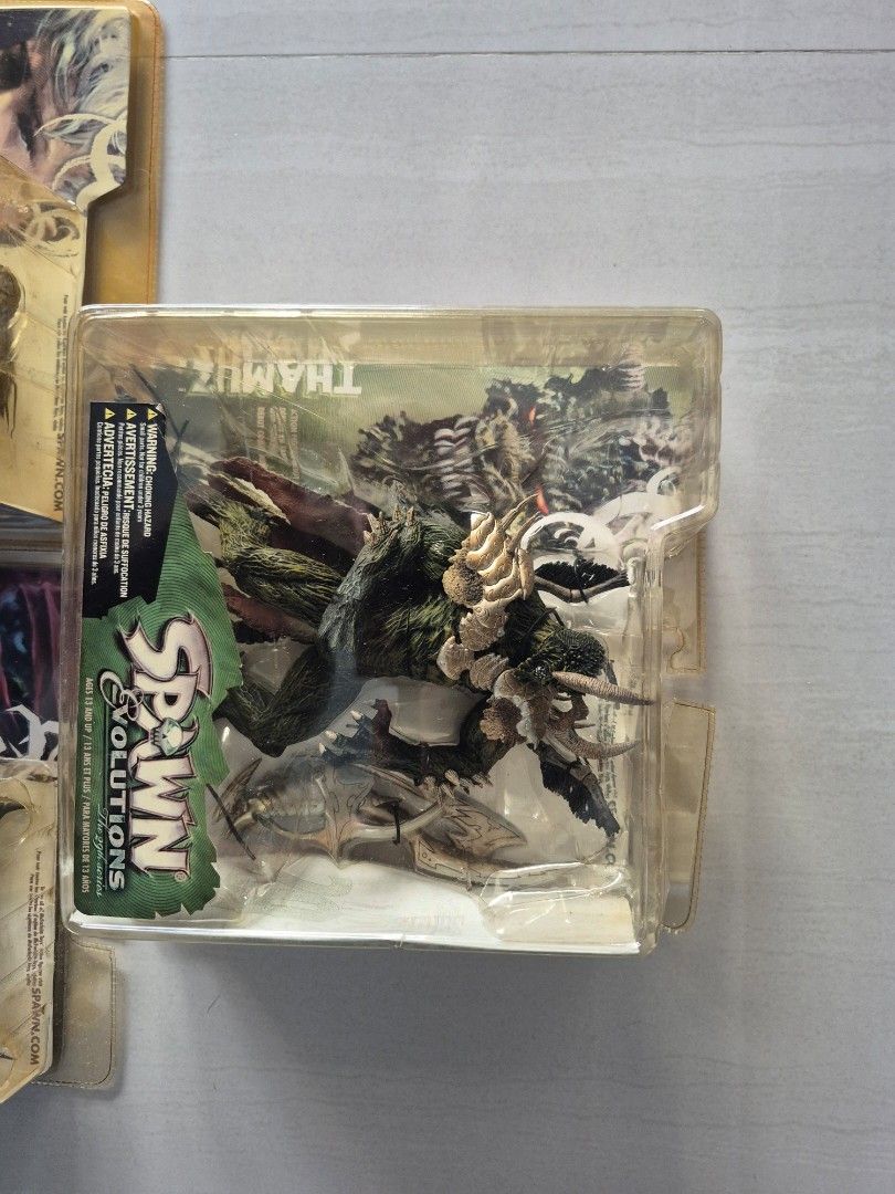 McFarlane Spawn Evolution series (Category: Toy Figures) located in Singapore. Submitted by giraffacus (Listing ID 1393216252, Image 2). Description: Set of 5 McFarlane Spawn Evolutions figures. Condition of boxes varies and can be found in photos. Collector item! .